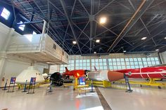 an airplane is on display in the hangar