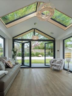 Solid Roof Conservatory Extension with Bi-Fold Doors opening up to the garden. Garden Room Extensions, House Extension Plans, Room Extensions, Sunroom Designs, House Extension Design, House Extension, Extension Ideas, Kitchen Extension, House Extensions