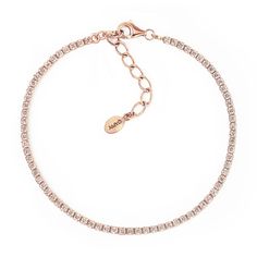 This thin single line Rose Gold tennis bracelet features tiny cubic zirconia crystals that sparkle at every angle. Won't snag on dress, adjustable sizing, lightweight and easy to wear. Rose Gold Vermeil White Zirconia Crystals Width 2mm Handcrafted in NYC Hypoallergenic, lead and nickel free #B088-RG Single Line Rose, Gold Tennis Bracelet, Single Line, Tennis Bracelet, Rose Gold Plates, Gold Vermeil, Cubic Zirconia, Gold Bracelet, Tennis