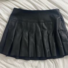 Urban Outfitters Black Patent Leather Pleated Mini Skirt. Brand New Never Worn And No Longer Sold. 28 Waist And 13 Inch Length #Goingout #Alt #Festival Urban Outfitters Black Mini Bottoms, Chic Fitted Skort From Urban Outfitters, Chic Fitted Skort By Urban Outfitters, Chic Fitted Urban Outfitters Skort, Urban Outfitters Black Mini Skort, Fitted Black Skort By Urban Outfitters, Black Urban Outfitters Mini Skirt For Spring, Black Lined Skirt By Urban Outfitters, Urban Outfitters Fitted Pleated Skirt