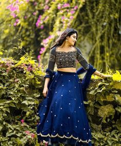 Wedding lehenga choli/ lehenga set with dupatta / teens lehenga/ bridal lehenga/blue hand embroidery lehenga / chiniya choli /crop top lehenga/ lehenga USA / crop top lehenga  / voggish / blue  lehenga  Here is a beautiful and modern crop top lehenga set in blue color  combination is a stunning piece for your upcoming parties!! It's a 3 piece set that includes skirt , hand embroidered blouse and dupatta, please find the details below , this set can be done in other combinations and customizable !! Please contact us for enquiries!!  Lehenga details : Skirt fabric : pure georgette hand work butis , soft net drill details with double lining !! Full length : 42 inch , has can can attached with double lining  Fit : skirt fit for waist sizes from 28 to 34 with belted waist !!  Blouse : Fabric :p Party Wear Lehenga With Sheer Dupatta, Anarkali Style Art Silk Lehenga, Traditional Party Lehenga With Sheer Dupatta, Anarkali Skirt Set With Zari Work For Festive Occasions, Festive Saree Skirt Set With Mirror Work, Designer Resham Embroidery Skirt Set For Party, Party Lehenga With Resham Embroidery, Elegant Skirt Set With Unstitched Blouse For Festive Occasions, Long Skirt Set With Unstitched Blouse For Wedding