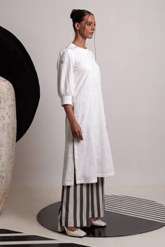 Ivory handwoven cotton round neck kurta with floral thread embroidery. Paired with striped flared pant. - Aza Fashions Floral Thread Embroidery, Pant For Women, Luxury Sale, Kurta With Pants, Cotton Embroidery, Thread Embroidery, Fashion App, Pants Pattern, Modern Bride