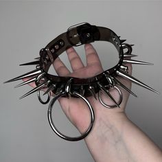 "MADE TO ORDER chocker, handmade by PatosErotika :) This item and the entire shop use vegan materials. IMPORTANT: the number of spikes can change due to choker length. BEWARE OF ALLERGIES: PVC straps, and metals can contain nickel.  -width 3cm\\1,2'', largest studs are 6cm/2,3'' long.- DISCLAIMERS: Since this is a handmade product there might be some imperfections. I'm not responsible for the choker not fitting you if you didn't measure it correctly. FOR MEASURING: take a string and place it around your neck, make sure it fits comfortably (not too tight and not too loose), and hold it with your fingers where it joins;  without losing the spot where you place your fingers, then remove it from your neck and measure the length of the string with a ruler.  The holes will be every centimeter fo Satanic Fashion, Nerd Boyfriend, Alt Clothes, Pendant Ring, Cute Black Cats, Ropa Diy, Punk Outfits, Personalized Pendant, Leather Chokers