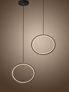 two circular lights hanging from the ceiling