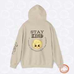 Bbokari Felix "STAY Kind" SKZoo Hoodie with Inspirational Quote | Stray Kids Unisex Hooded Sweatshirt for STAYs STAY inspired and cozy with this set of SKZoo hoodies, featuring your favorite Stray Kids characters alongside uplifting quotes featuring a reference to the best fans in the world. This collection of Rhyming Orange-designed hoodies are designed to empower every STAY and celebrate the incredible qualities of the group members. Made from a soft 50% cotton, 50% polyester blend, these Gildan unisex heavy blend hoodies provide comfort and style with a classic fit, double-lined hood, and kangaroo pocket. Perfect for expressing your love for SKZ while spreading positivity! Features: - Material: 50% cotton, 50% polyester - Fit: Unisex, classic fit with a double-lined hood - Ribbed cuffs Playful White Hoodie For Streetwear, Playful Hooded Hoodie For Streetwear, Playful Hoodie With Drawstring Hood For Streetwear, Playful Letter Print Hoodie For Winter, Playful Winter Hoodie With Letter Print, Playful Letter Print Winter Hoodie, Sporty Cartoon Print Hooded Hoodie, Sporty Hooded Hoodie With Cartoon Print, Stray Kids Shoes