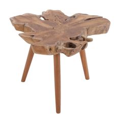 a small wooden table that has been carved into the shape of a flower on it