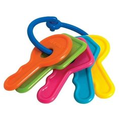 five colorful plastic keys are stacked on top of each other