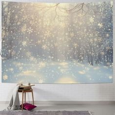 a snowy scene with snow flakes hanging on the wall