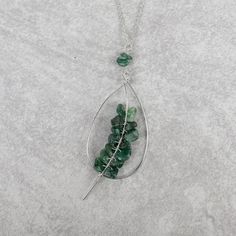 Adorn your neck with the beauty of Mother Nature. The Athira Pendant Necklace features a teardrop-shaped pendant, intricately handcrafted using wire and beautiful aventurine gemstones to evoke the grace of the living world around us. Length is adjustable for preference. Handcrafted in India by our fair trade partner Ta Wire Wrapped Teardrop Pendant Necklace, Adjustable Wire Wrapped Teardrop Pendant Necklace, Adjustable Teardrop Pendant Necklace With Wire Wrapped, Wire Wrapped Teardrop Pendant Necklace For Healing, Bohemian Teardrop Silver Plated Wire Jewelry, Bohemian Teardrop Silver Plated Jewelry, Wire Wrapped Teardrop Necklaces For Jewelry Making, Adjustable Teardrop Crystal Necklace, Wire Wrapped Teardrop Pendant Necklace Gift