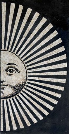 the sun and moon are depicted in this mosaic