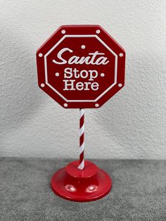 a red stop sign sitting on top of a table