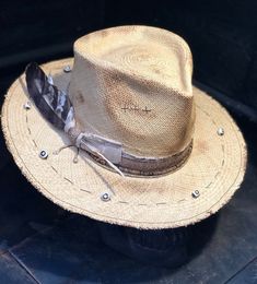 "Boho Rock straw hat \" Mystical sand \" All our hats are made to order ,we only use beaver Fur felts and we offer blends or 100%. The accessories as well as the bands that N.T.T.E uses for each individual customization are the result of a research of rare vintage pieces. N.T.T.E is a Fashion brand inspired from bohemian /rock n roll vibes . Each hat is a unique piece created from the research of vintage accessories and original designs, tailored specifically for each customer. Please before to Custom Cowboy Hats, Hat Inspiration, Womens Beach Hat, Perfect Beach Bag, Boho Rock, Straw Fedora Hat, Mens Hats, Straw Cowboy Hat, Painted Hats