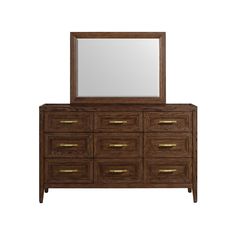 a wooden dresser with a mirror on top and drawers below it, in front of a white background