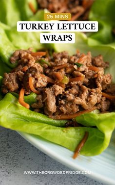 lettuce wraps with meat and carrots in them on a white plate, text overlay reads 25 mins turkey lettuce wraps