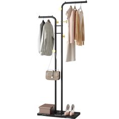 a coat rack with shoes and purses on it