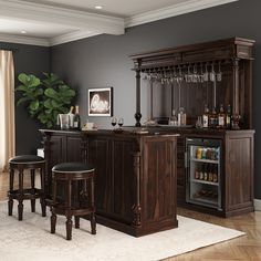 a home bar with stools and wine glasses