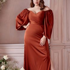 Designed With A Sensual Attitude And Fashion-Forward Details, 7482 Features A Flattering Sweetheart Bodice Complemented With A Slim, Sophisticated Skirt And Side Slit Leg. The Soft Billowy Sleeves Can Be Worn Off-Or-On The Shoulder, Offering A Unique, Versatile Look. This Dress Is A Must-Have For Any Special Occasion. Color Sienna Material: 100% Polyester Open Back Long Dress Occasion: Formal, Evening, Cocktail, Guest Of Wedding, Bridal, Bridesmaid, Banquet, Prom, Ball, Graduation, Special Occas Satin Formal Gown, Long Sleeve Bridesmaid Dress, Cinderella Divine, Beautiful Bridesmaid Dresses, Plus Size Prom, Satin Long Sleeve, Bridesmaid Dresses Prom, Plus Size Prom Dresses, Satin Gown