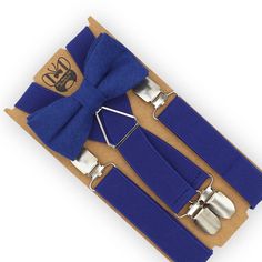 This beautiful Royal Blue bow tie & suspenders set is a perfect choice for a holiday, wedding, groomsmen, best man, ring bearer outfit, birthday celebration or any other special occasion! SIZING:   Х-SMALL: 6mo-4yrs  * Bow Tie: 4 in wide  * Suspenders: Adjustable from 16" to 27" (38 cm - 68 cm), X- back. SMALL: 5yrs-10yrs  * Bow Tie: 4 in wide * Suspenders: Adjustable from 20" to 32" (50 cm - 85 cm), X- back. MEDIUM: 10yrs-18yrs (up to 5'6") * Bow Tie: 4.5 in wide * Suspenders: Adjustable from 2 Bow Tie And Suspenders Set For Father's Day Party, Blue Bow Tie With Ribbon As A Gift, Blue Bow Tie For Party Or Father's Day, Blue Dapper Suit And Tie Accessories For Party, Blue Adjustable Bow Tie And Suit Accessories, Blue Bow Tie For Wedding And Father's Day, Blue Bow Tie With Bow Tie Back For Groom, Dapper Blue Bow Tie For Groom, Blue Bow Tie Suit Accessories For Party