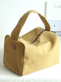 #handbag #yellow #canvas #accessories Cotton Pouch Bag, Bathroom Bag, Canvas Accessories, Travel Handbag, Bags Online Shopping, Diy Bags Patterns, Diy Bags Purses, Yellow Handbag, Travel Handbags