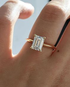 Emerald Engagement Ring, Emerald Cut Diamond Ring, Lab Grown Diamond, Emerald Cut Wedding Ring, Natural Diamond Ring, Single Diamond Ring, Promise Ring For Her, Proposal Ring, Gift This ring features an emerald solitaire diamond elegantly secured in a four-prong setting on a solid gold band for a classic and timeless look 𝐑𝐢𝐧𝐠 𝐃𝐞𝐭𝐚𝐢𝐥𝐬:  ↣ Made-To-Order. ↣ Gold: 14K / 18K Solid Gold.  ↣ Gold Color: Yellow Gold, Rose Gold, White Gold  ↣ Number of Diamonds: 1 ↣ Diamond Cut: Emerald ↣ Setting Type: Prong ↣ We offer FREE ENGRAVING service on all our jewelry.  ↣ Ring Width : 1.50 MM ↣ Ring Thickness : 1.50 MM 𝐋𝐚𝐛 𝐆𝐫𝐨𝐰𝐧 𝐃𝐢𝐚𝐦𝐨𝐧𝐝 𝐃𝐞𝐭𝐚𝐢𝐥𝐬: ↣ Lab Grown Focal Diamond: 0.10 CT, 0.25 CT, 0.50 CT, 0.75 CT, 1.00 CT, 1.50 CT, 2.00 CT, 2.50 CT, 3.00 CT. ↣ Lab Diamond Clarity Knife Edge Engagement Ring, Gold Knife, Single Diamond Ring, Emerald Cut Solitaire Ring, Wedding Rings Emerald Cut, Emerald Cut Diamond Ring, Solid Gold Band, Emerald Engagement Ring Cut, Natural Diamond Ring