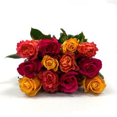 a bouquet of colorful roses on a white background