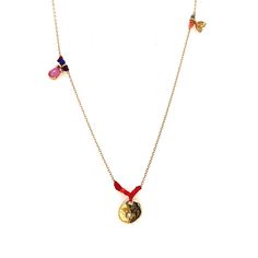 This 10kt yellow gold chain is linked with multi-color waxed nylon sections and assorted beads in festive colors, along with tiny treasure charms. A petite diamond studded 10mm medallion hangs in the center, 5mm rainbow charm with 6 sparkling diamonds, a 5mm luna crescent charm dance up 1 side of a delicate cable chain and a pear shaped pink tourmaline charm and fairy tinsel complete this truly unique piece, necklace measures 16" total length. Designer: Scosha, created in Brooklyn. Multicolor Dangling Charms Pendant Jewelry, Multicolor Pendant Jewelry With Dangling Charms, Bohemian Yellow Gold Necklace With Charms, Festive Yellow Gold Jewelry With Delicate Chain, Gold Charm Necklaces With Colorful Beads For Jewelry Making, Yellow Gold Beaded Pendant Jewelry, Multicolor Round Necklaces With Charms, Gold Pendant Jewelry With Colorful Beads, Rainbow Beaded Jewelry