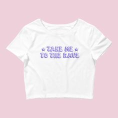 Introducing our "Take Me to the Rave" Y2K Rave Baby Tee – a stylish and comfy addition to your wardrobe, perfect for all the electronic music enthusiasts and festival-goers. This crop top is designed to capture the essence of the Y2K rave culture and the excitement of electronic music festivals. Embrace the rave vibes with this trendy baby tee. The "Take Me to the Rave" design signifies your passion for electronic music and the electrifying atmosphere of music festivals, making it an ideal choic Trendy Graphic Design Tops For Concert, Trendy Crew Neck Tops For Music Festival, Graphic Tee Tops With Graphic Design For Music Festival, Trendy Graphic Print Tops For Music Festival, Graphic Print Tops For Music Festivals Streetwear, Summer Streetwear Crop Top With Logo Print, Graphic Crew Neck Top For Music Festivals, Music Festival Graphic Crew Neck Tops, Graphic Design Crew Neck Top For Music Festivals