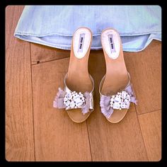 These Sparkly Miu Miu Wood Clogs Have Multi Crystal Broach Under A Taupe Bow. They Run A Little Smaller Than Their Size. Throw Them On With A Denim Dress For Spring, Wear Them With Cut Off Jeans Or Flared Pants. They Are Fun To Wear With Almost Anything! Wood Clogs, Spring Wear, Miu Miu Shoes, Dress For Spring, Cut Off Jeans, Flared Pants, Mule Clogs, Mules Shoes, Flare Pants