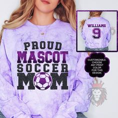 Show off with this custom and personalized soccer Mom spirit wear with your mascot's name, team colors, and then finally on the back is the last name and player number. These tees and sweaters are great gifts for soccer Moms or bonus Moms, whether your favorite soccer player plays school soccer, or on a traveling soccer team! You can customize the colors in the personalization section to reflect your favorite soccer team. It is trendy to size up 2 sizes for an oversized look or size down for a t Team-colored Sporty Sublimation Design With Name Print, Sporty Team-colored Sublimation Design With Name Print, Customizable Sublimation Design For School Spirit Sports, Customizable Sublimation Design For School Sports, Customizable Sublimation Crew Neck Design With Team Spirit, Varsity Style Sublimation Design With Team Name For Fans, Sublimation Design With Team Name For Sports, Personalized Sporty T-shirt For Game Day, Sporty Personalized T-shirt For Game Day