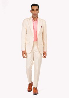 Jacket & pants included. Vest optional. Delivered in 2-3 weeks. Free shipping. Covered by our Free Remake Guarantee. Complete the look with Shirts, Ties & Squares. Fitted Beige Cotton Suits, Tailored Beige Cotton Suit, Tailored Spring Cotton Suits, Classic Spring Cotton Suit, Beige Cotton Suits For Workwear, Summer Cotton Suits With Long Sleeves, White Cotton Semi-formal Suit, Cream Suits With Lapel Collar For Spring, Tailored Beige Suit For Spring