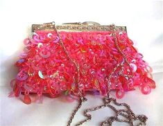 Beautfiul Womens Hot-Pink Sequin and Beaded Evening beaded Bag Clutch Purse This stunning beaded handbag has a designer beaded pattern for classy and elegant look.   This brand new eye-clutching bag is perfect for evening party and ball. Size:  (WxHxD) 8.5" x 5" x  1.5" (21cm x 12.5cm x 3.5 cm) Color:  Hot-Pink Material:  Satin/Sequin, Beaded   (13 ozes) Strap:  47" metal shoulder strap (removable) Color of metal parts:  silver Feature:  clasped with an inside mobile phone pocket. The outside is Summer Pink Beaded Bag, Festive Pink Embellished Bag, Summer Party Beaded Bag, Festive Pink Embellished Bags, Summer Party Beaded Bags, Pink Party Bags For Spring, Glamorous Pink Party Bag, Elegant Pink Beaded Bag, Summer Party Embellished Bags