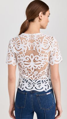 Fabric Weight: LightweightLightweightHeavyweightFabric: Lightweight lacePolished gold-tone decorative buttonsRound necklineShort sleevesFlap breast pocketsSheerShell: 100% polyesterTrim: 100% cottonDry cleanImported, ChinaStyle #SELFP30804 Guipure Lace Top, White Lace Top, Guipure Lace, Decorative Buttons, White Top, White Tops, Self Portrait, Round Neckline, Fabric Weights