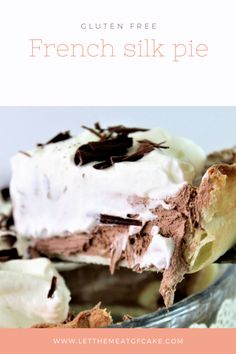 a close up of a piece of cake with whipped cream and chocolate shavings