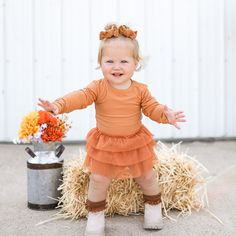 This Pumpkin Rib Dream Tutu Bodysuit Dress is the perfect pick-me-up for your little princess! Get her ready for any occasion with this stylish outfit - from the vibrant pumpkin color, to the fun tutu, she'll look "gourdgeous" in this dress. Let the dreamy wonderland begin! Made from theÂ softest and most breathableÂ bamboo viscose material,Â your babe won't want to take this off! Designed for all the loveÂ and extra snuggles! Easy diaper changes, you got it-made with 3 easy to remove snaps and Toddler Flower Girls, Girls Gloves, Girls Dress Outfits, Toddler Flower Girl Dresses, Infant Flower Girl Dress, Tea Party Dress, Christening Outfit, Gymnastics Outfits