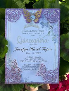 a purple and gold wedding card with butterflies