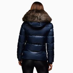 Overview: Go for the classy outerwear by Jack1T Women's Prime Slick Down Hooded Puffer Jacket features classic fit, high volume quilt paneling, short length to sit at the high hip when worn, luxurious faux fur hood trim, chunky zip closures, curated cast metal details, secure-zip pockets, structured rib cuffs, textured print signature, full-length center front storm flap with signature print, soft-touch bungee storm cords, inner utility pocket. Features: Color: Navy Style: W011CLA20159N02 Hooded Puffer Jacket With Ribbed Cuffs, Fitted Hooded Puffer Parka, Sporty Fitted Outerwear With Double-lined Hood, Fitted Puffer Jacket With Double-lined Hood For Cold Weather, Fitted Hooded Parka With Padded Collar, Long Sleeve Down Outerwear With Faux Fur Trim, Fitted Puffer Parka For Fall, Fitted Hooded Jacket With Padded Collar, Sporty Hooded Jacket For Winter