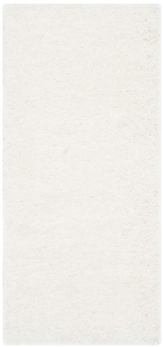 an image of a white rug on the floor