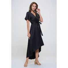 Our Satin Woven Georgia Faux Wrap Dress exudes a sophisticated and elegant feel. A faux wrap tie-waist detail and a hi-low hem that effortlessly flows with every movement. Pair it with a statement necklace and heels for a glamorous look. Prepare to turn heads at any event, from garden parties to evenings. Made in USA. Material - 100% Polyester. Machine washable. Loose Midi Dress, Split Sleeve, Lotus Leaf, Chiffon Ruffle, Dress Cuts, Side Split, Beach Dress, V Neck Dress, Colorful Fashion