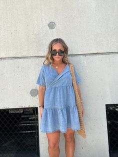 WRAP LIGHT DENIM RUFFLE TIERED MINI DRESS MODEL IS WEARING A SIZE SMALL RUNS OVERSIZED COLOR: DENIM MODEL MEASUREMENTS: 5’2”, SIZE 6, 150 LBS, BUST 35”, WAIST 28”, HIPS 37”, BRA SIZE 34D Tencel Dress, Wrapped Lights, Tiered Mini Dress, 150 Lbs, Light Denim, Model Dress, Bra Sizes, Model Measurements, Size 6