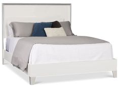 a white bed with gray and blue pillows on it's headboard, in front of a white background