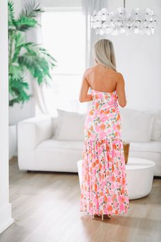 We love this strapless floral print maxi gown! Fit: True to siz with stretch making it an easy fit. Model is 5'6 wearing size small. Maxi Gown, Maxi Gown Dress, Floral Print Maxi, Maxi Gowns, Gown Dress, Pink Orange, Pink Dress, Gowns Dresses, Pink And Orange