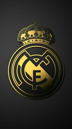 the real madrid crest is shown in gold and black