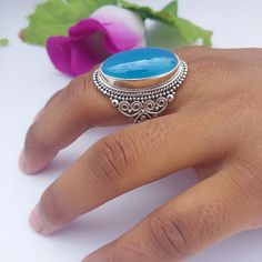 INTRODUCE OUR NEW JEWELRY PRODUCT  " 925 BLOE ONYX STATEMANT SILVER RING "  MADE BY RADHE SHYAMA JEWELLERS. ::ITEM DETAILS:: MATERIAL:-  SILVER (92.5) GEMSTONE:-BLUE ONYX STONE SIZE :- FREE SIZE FINISH:-  OXIDIZED WITH HEND POLISHED, SILVER POLISHED  WEIGHT:--    12gm - 16gm APPROX  ---------------------- :: OTHER INFORMATION ::   THIS IS A HANDMADE PRODUCT, WHICH IS MADE BY LOVE AND CARE.  ALL ITEMS ARE BEAUTIFULLY AND PARFECTLY PACKAGED IN JEWELRY BOXES. IF YOU WANT ANY  FURTHER INFORMATION AB Adjustable Blue Moonstone Ring Gift, Gift Turquoise Ring With Polished Finish, Nickel-free Spiritual Ring For Gift, Unique Polished Turquoise Ring For Gift, Adjustable Blue Ring With Polished Finish, Unique Turquoise Ring With Polished Finish As Gift, Sterling Silver Turquoise Ring, Perfect As A Gift, Silver Oval Topaz Ring Gift, Silver Oval Topaz Ring As Gift