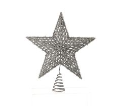 a metal christmas tree topper with a star on it's side and spirals in the middle