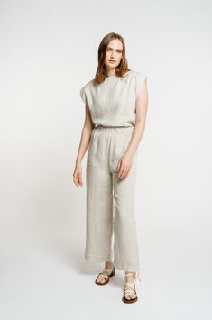 Our best-selling pant, complete with a high-waisted fit and cropped, wide-leg, back in customer favorite Natural. A cool, casual feel courtesy of our luxurious certified organic linen textile. The fully-elastic waistband offers comfort for all-day wear. Pair them with our Everyday Top for a powerful statement look or with any of our tops for a chic handmade ensemble. We appreciate the natural beauty of linen's undyed color and are excited to highlight it in our Natural colorway. Made with 100% O Chic Linen Wide Leg Pants With Straight Hem, Relaxed Fit Linen Wide Leg Pants With Straight Hem, Chic Linen Wide Leg Pants For Daywear, Elegant Linen Pants With Elastic Waistband, Relaxed Linen Wide Leg Pants For Daywear, Elegant Linen Wide Leg Pants For Daywear, Relaxed Fit Wide Leg Pants In Flax For Loungewear, Summer Linen Wide Leg Pants With Straight Hem, Neutral Linen Pants With Straight Hem