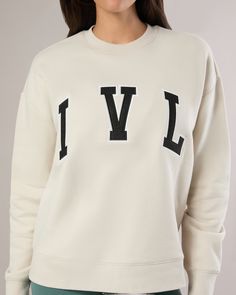 Designed for an oversized fit, this crewneck is cut from soft cotton terry with a varsity-style IVL logo in front and ribbed trims. Crewneck Oversized fit Varsity letter IVL logo Terry 100% Cotton The Oversized Crewneck Sweatshirt pairs well with the Seamless Biker Short and the Seamless Sweetheart Bra. Tennis Lifestyle, Sweat Sets, Varsity Style, Varsity Letter, Oversized Crewneck, Summer Pajamas, Biker Short, Fabric Sale, Short Leggings