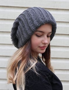 Slouchy winter hat PLEASE PAY ATTENTION - THE HAT IS EXTRA LARGE, EXTRA SLOUCHY, EXTRA THICK, AND EXTRA LONG Extra large knitted slouchy beanie is super stylish and warm. It is knitted using very thick yarn and it has 2 layers to keep your head warm and cozy on even the coldest winter days! The hat is very expandable and you can easily fold it to look different. This baggy hat will nicely suit to both men and women. Material 70% - acryl 30% - wool Ready for shipping in 1-2 business days. Gray Brimmed Crochet Hat For Winter, Slouchy Winter Beanie, Slouchy Beanie For Cold Weather, Slouchy Beanie Bonnet For Winter, Winter Slouchy Bonnet Beanie, Slouchy Beanie Bonnet For Cold Weather, Warm Slouchy Beanie Bonnet, Winter Beret Beanie One Size Fits Most, Slouchy Winter Beanie Bonnet