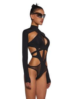 in black spandex and mesh construction with strappy cut-out designs all over. Racerback design, adjustable tie back closures, embroidered "D" logo on back, and a detachable long sleeve shrug. Fitted Cutout Swimwear For Night Out, High Stretch Nylon Bodysuit For Night Out, High Stretch Edgy Bodysuit For Club, Edgy High Stretch Bodysuit For Club, Fitted Black Backless Bodysuit, Fitted Nylon Bodysuit For Night Out, Edgy High-stretch Bodysuit For Club, Edgy Stretch Bodysuit For Club, Party Bodysuit With Cutout And High Stretch