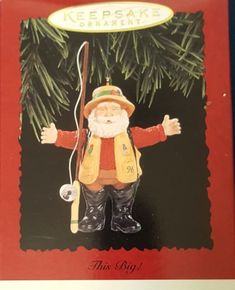 a christmas ornament with a fishing man on it's front and back