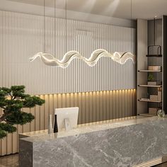 an office lobby with a marble counter top and white walls, along with a tree in the center